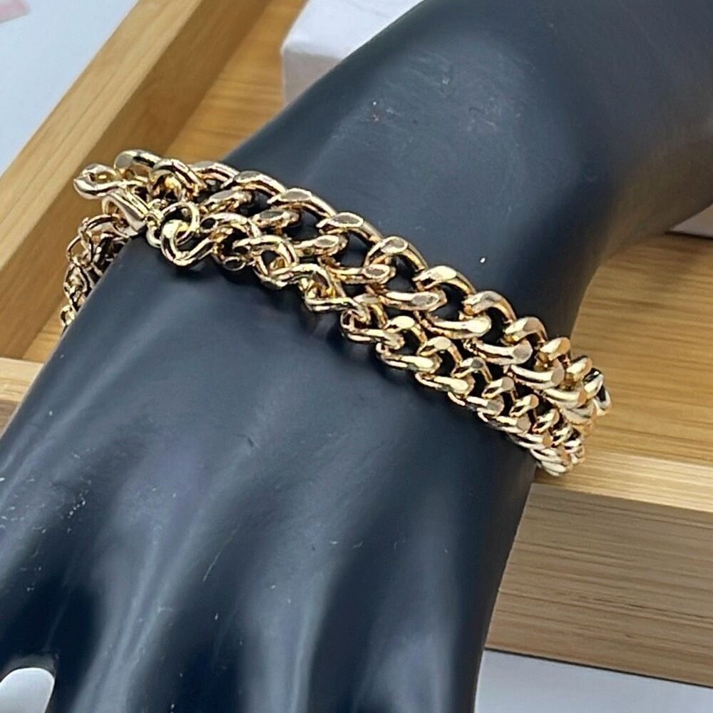 Two gold colored chains approximately 7 and 7.5” long